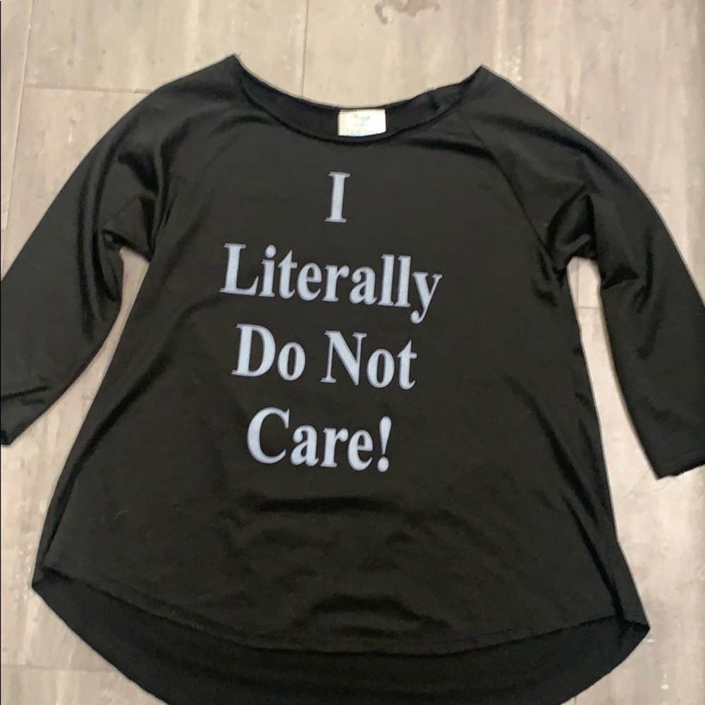 Black three quarter sleeve shirt.